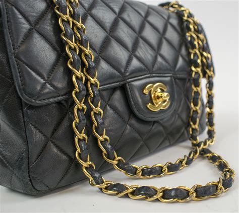 black and gold chanel quilted bag|Chanel black bag price.